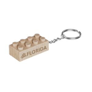 Timber Brands engraved wooden brick keychain featuring Florida with wave icon, compatible with plastic brick systems