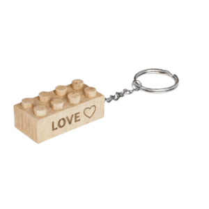 Timber Brands engraved wooden brick keychain featuring the word Love with heart icon, compatible with plastic brick systems
