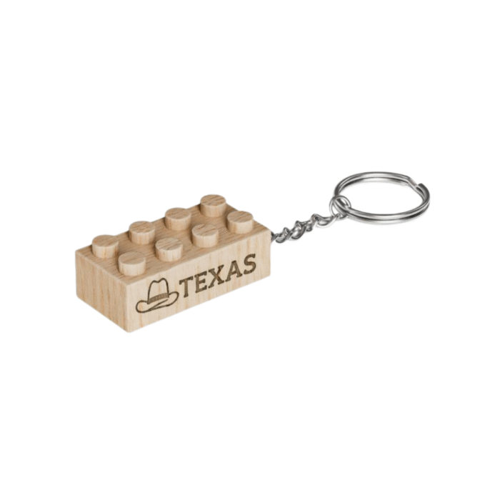 Timber Brands engraved wooden brick keychain featuring the word “Texas” with cowboy hat icon, compatible with plastic brick systems