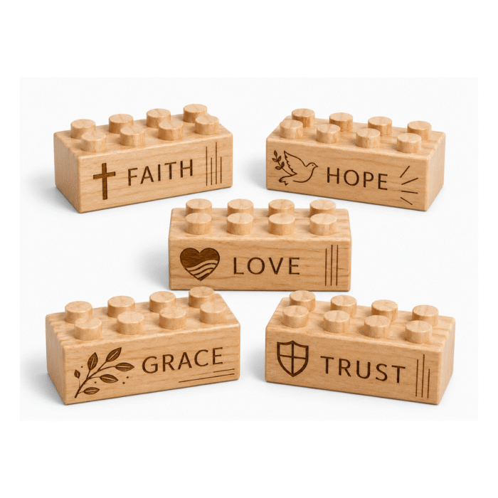 Faith Theme Custom engraved standard 2x4 wooden bricks featuring inspirational words Faith, Hope, Love, Grace, and Trust with symbolic icons. FSC-certified eco-friendly wood building blocks compatible with LEGO-compatible bricks and made in the USA for meaningful gifting and intentional play.