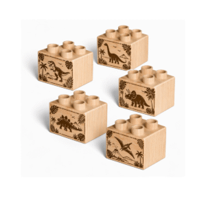 Custom engraved 2x2 plus size wooden bricks compatible with LEGO DUPLO featuring dinosaur designs including T-Rex, Brontosaurus, Triceratops, Stegosaurus, and Pterodactyl. FSC-certified eco-friendly wood building blocks made in the USA for imaginative play and creative learning.