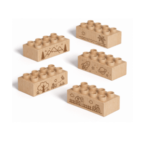 Custom engraved 2x4 plus size wooden bricks compatible with LEGO DUPLO featuring mountain, beach, space, nature, and farm scene designs. FSC-certified eco-friendly wood building blocks made in the USA for imaginative play, storytelling, and creative exploration.