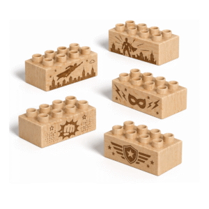 Custom engraved 2x4 plus size wooden bricks compatible with LEGO DUPLO featuring superhero-inspired designs including flying hero, city guardian, power mask, impact burst, and shield emblem. FSC-certified eco-friendly wood building blocks made in the USA for imaginative play and creative storytelling.