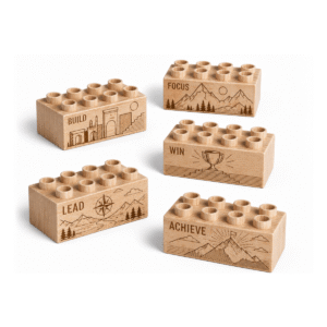 Custom engraved 2x4 plus size wooden bricks compatible with LEGO DUPLO featuring Build, Focus, Win, Lead, and Achieve motivational designs. FSC-certified eco-friendly wood building blocks made in the USA for confidence-building, imaginative play, and creative learning.