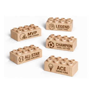 Custom engraved 2x4 plus size wooden bricks compatible with LEGO DUPLO featuring football, basketball, baseball, soccer, and golf sports designs. FSC-certified eco-friendly wood building blocks made in the USA for imaginative play, sports-themed storytelling, and creative learning.