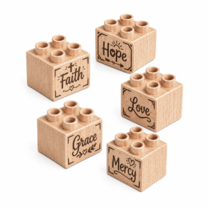 Set of five custom engraved wooden Plus bricks with faith word designs including "Faith," "Hope," "Grace," "Love," and "Mercy"