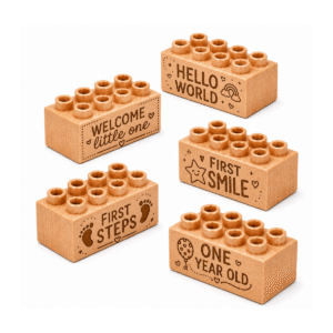 Set of five custom engraved wooden Plus bricks with "Hello World, Welcome Little One, First Steps, First Smile, One Year Old" baby milestone designs