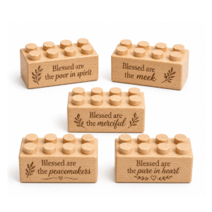Set of five custom engraved wooden bricks with Beatitudes phrase designs including "Blessed Are the Poor in Spirit," "Blessed Are the Meek," "Blessed Are the Merciful," "Blessed Are the Peacemakers," and "Blessed Are the Pure in Heart"