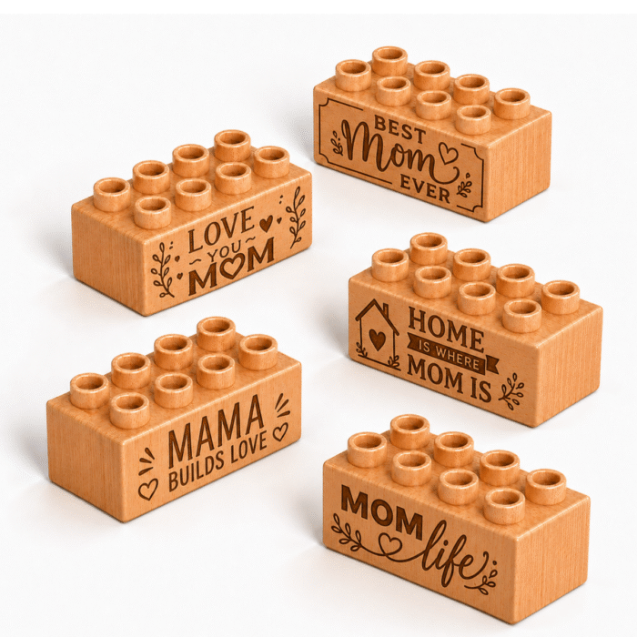 Engraved 2x2 Plus Wooden Brick Set – Mother's Day Phrases Set of five custom engraved wooden Plus bricks with Mother's Day phrase designs including "Best Mom Ever," "Love You Mom," "Mama Builds Love," "Home Mom Is," and "Mom Life"