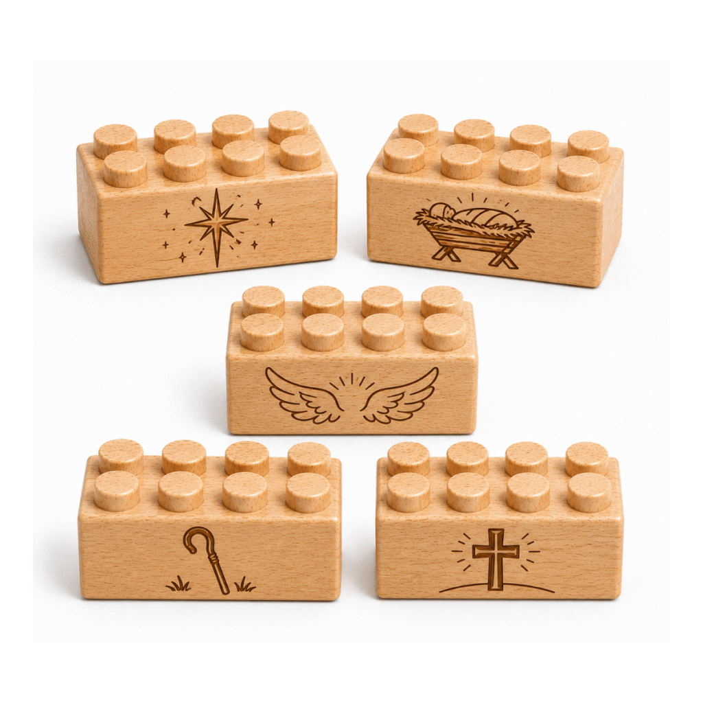 Set of five custom engraved wooden bricks with nativity icon designs including star, manger, angel wings, shepherd's staff, and cross