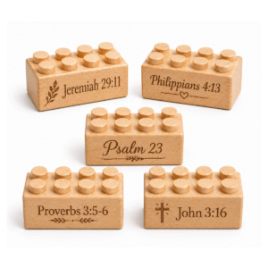 Set of five custom engraved wooden bricks with scripture reference designs including "Jeremiah 29:11," "Philippians 4:13," "Psalm 23," "Proverbs 3:5-6," and "John 3:16"