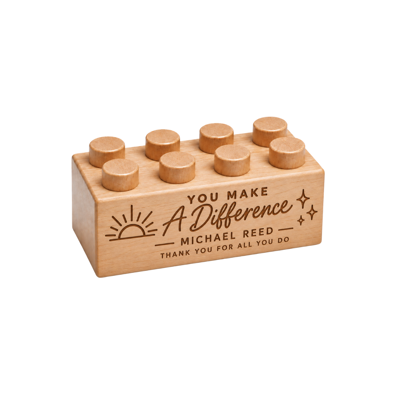 Wooden brick engraved with You Make a Difference, Michael Reed, and Thank You for All You Do, with sunrise and star artwork.
