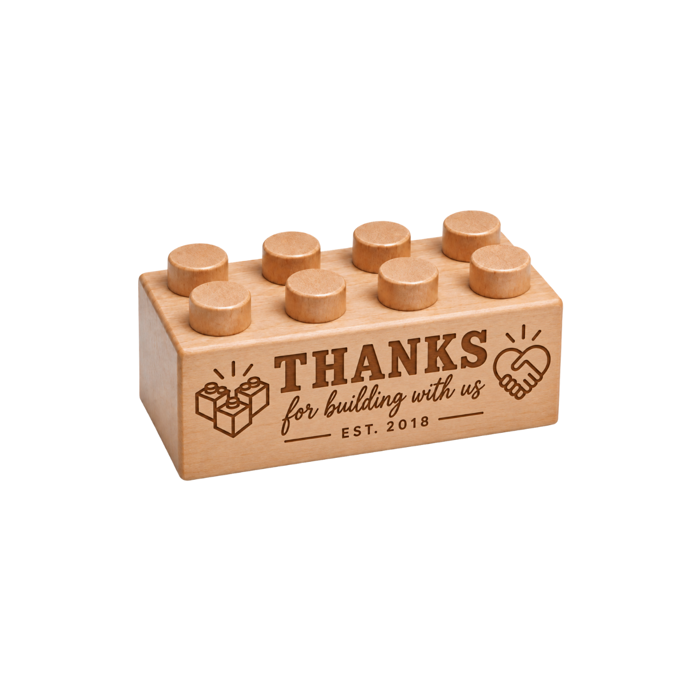 Wooden brick engraved with Thanks for Building with Us and Est. 2018, with brick and handshake artwork.