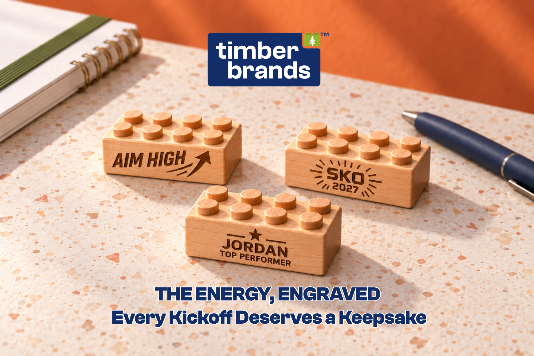 Engraved wooden bricks reading "Aim High," "SKO 2027," and "Jordan Top Performer" for sales kickoff gifts.