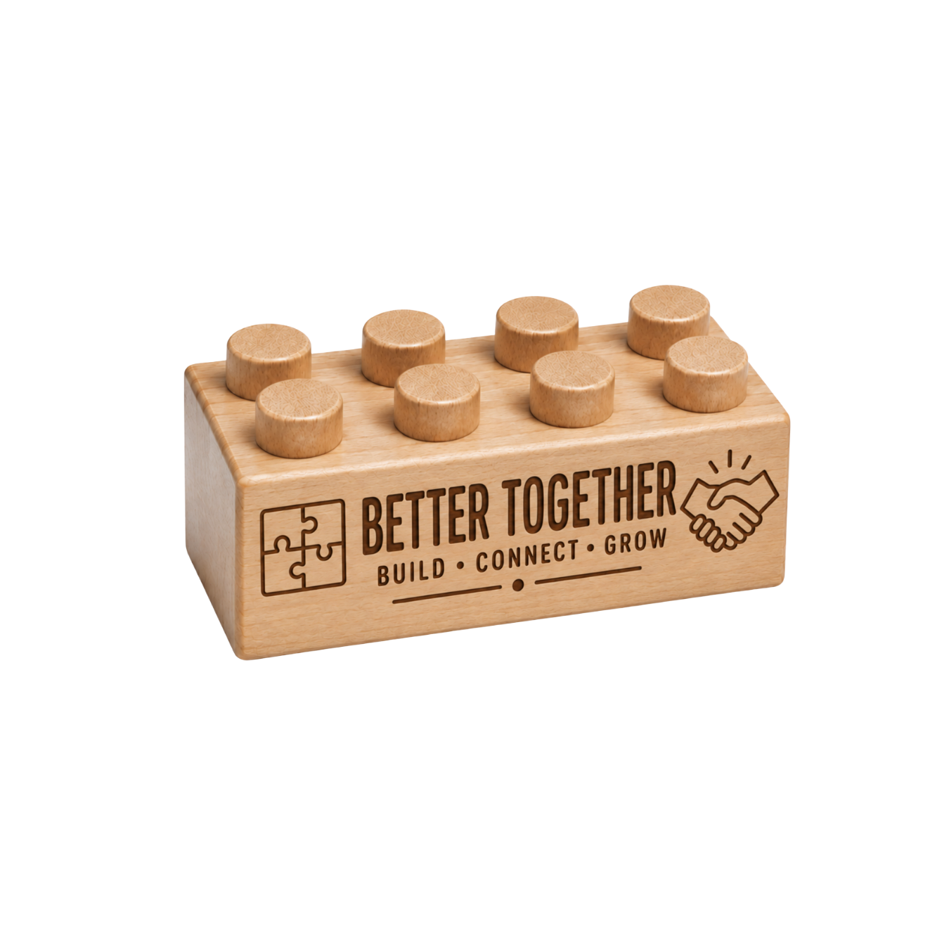 Wooden brick engraved with Better Together, Build Connect Grow, a puzzle icon, and a handshake.