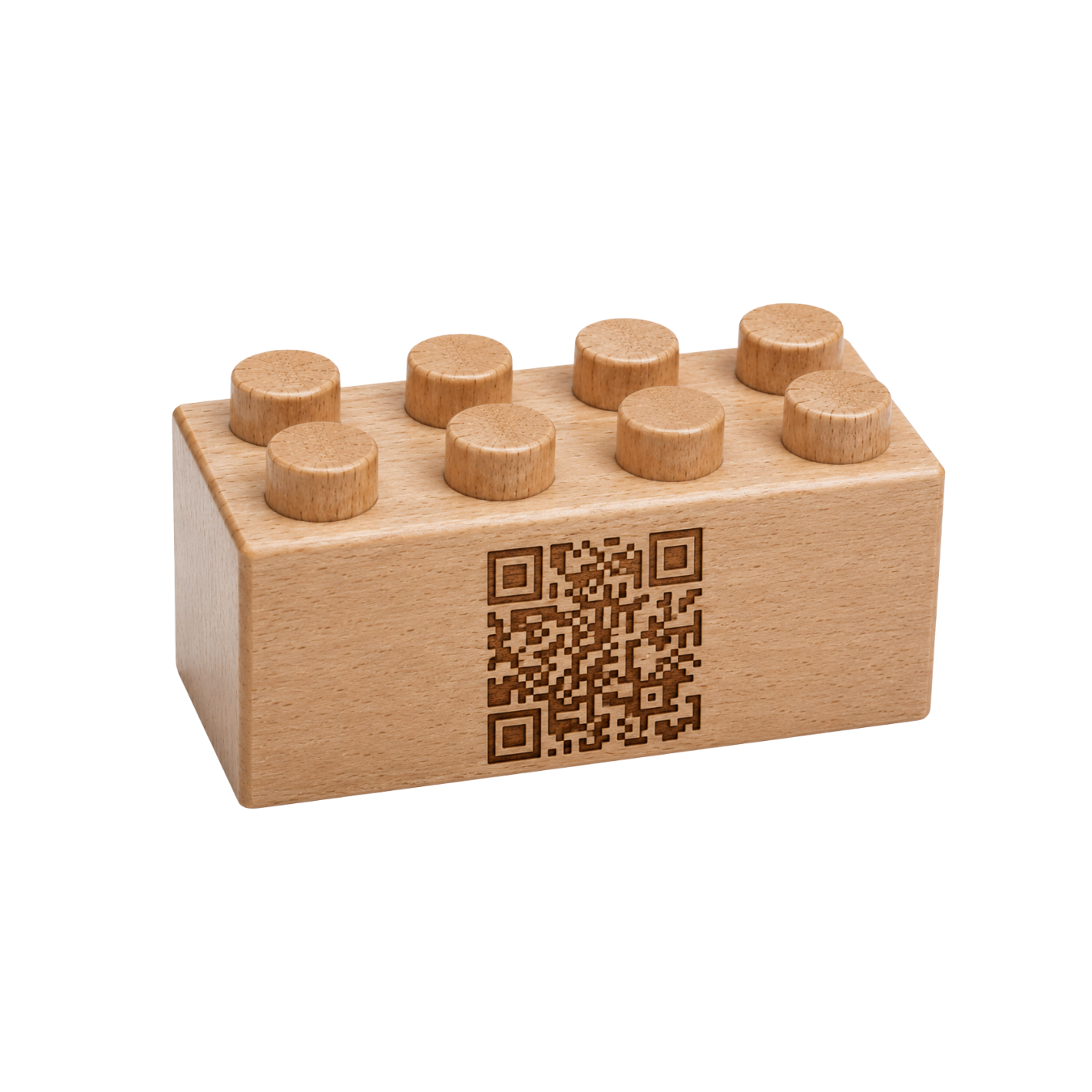 Wooden brick with a large QR code engraved on the front.