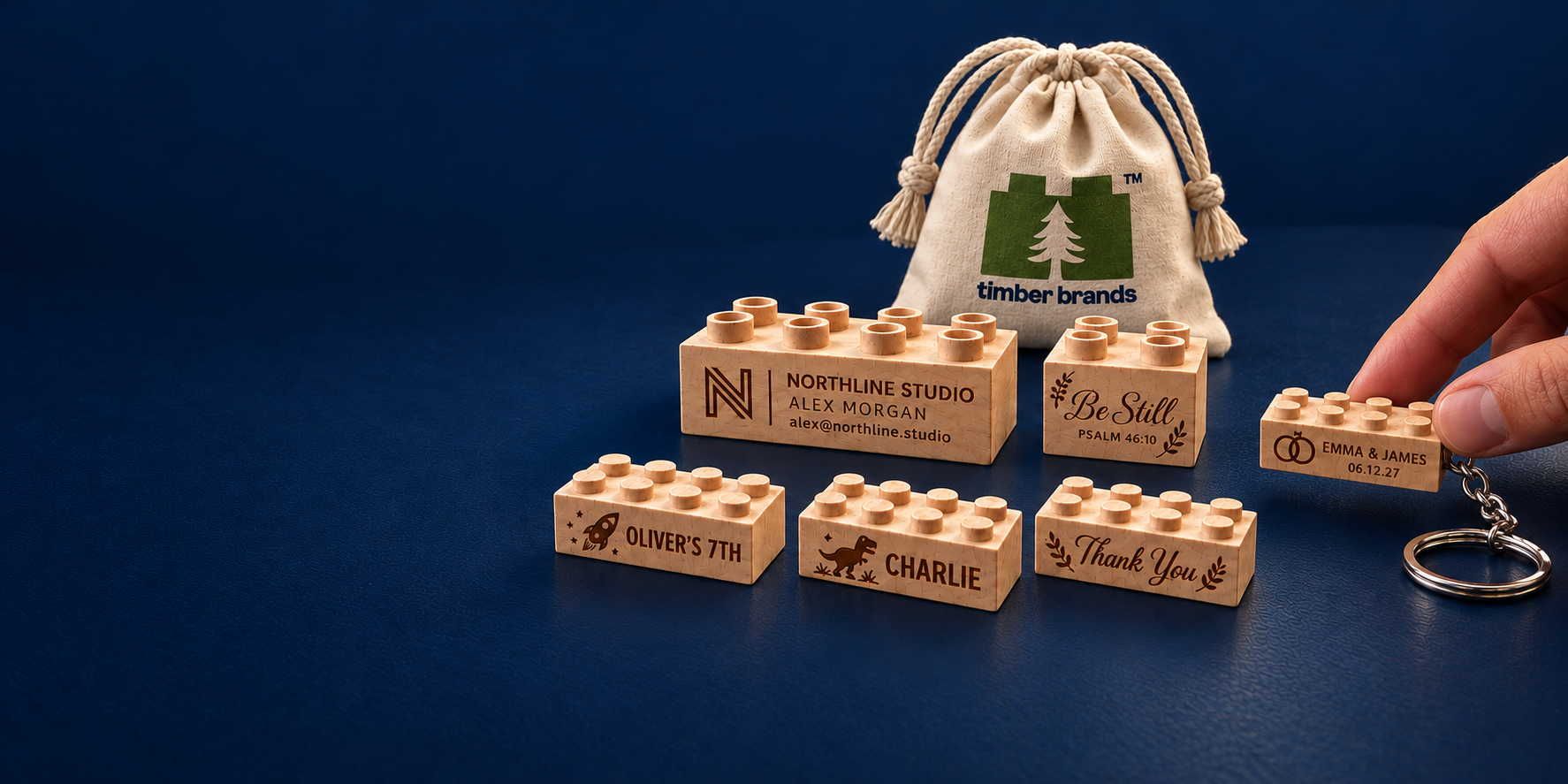 Personalized wooden bricks with business branding, a Bible verse, birthday and name designs, and a thank-you message beside a wedding keychain and Timber Brands bag
